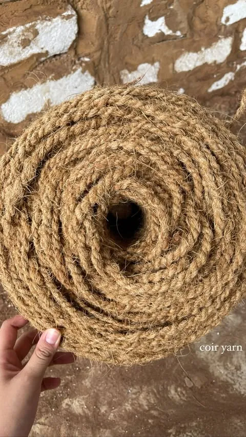 Top view of a 4–6 mm twisted coir rope coil