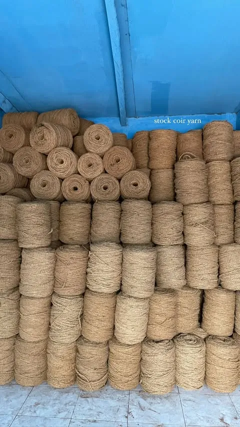 Warehouse stacked with coir yarn coils